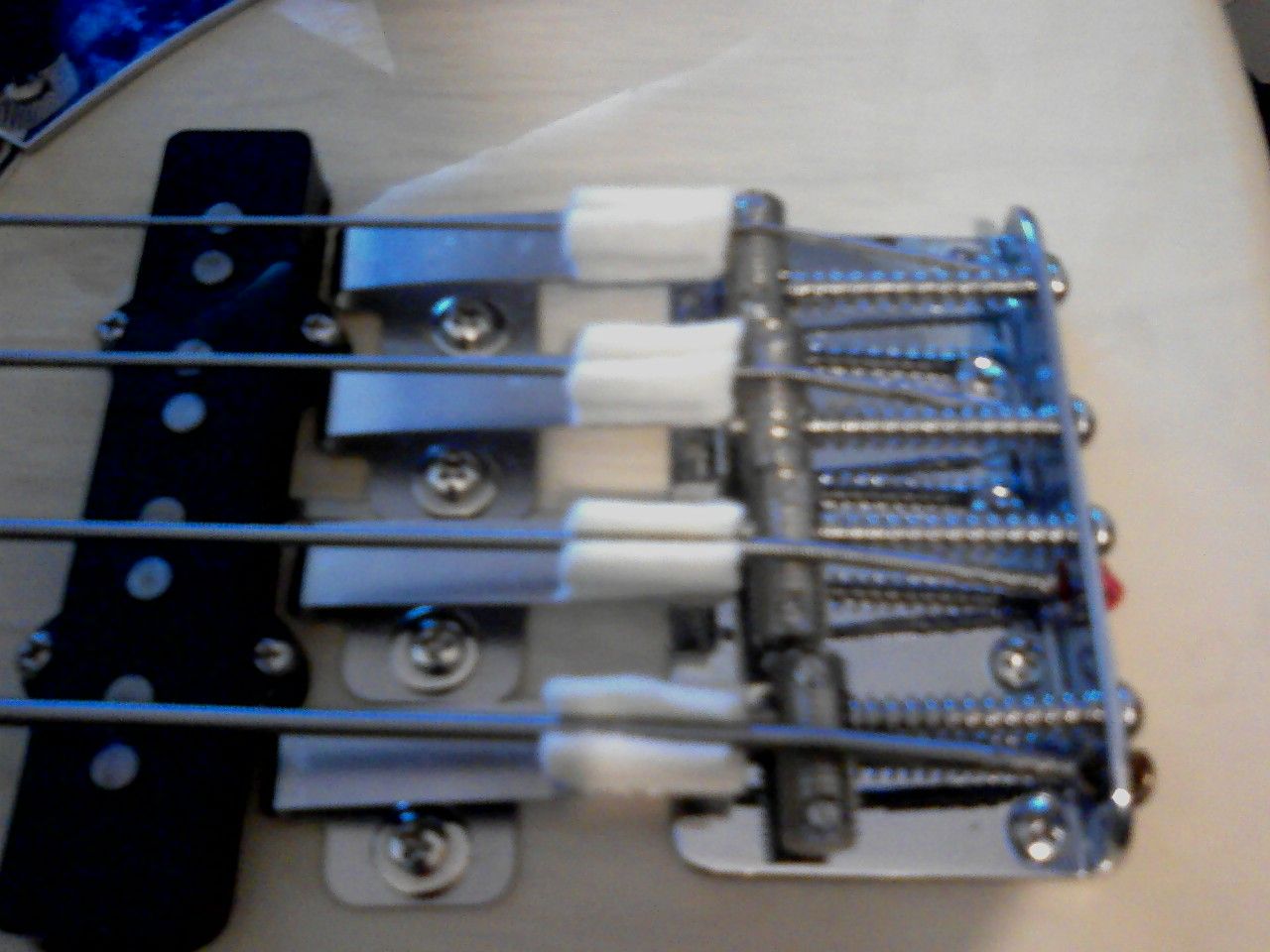 '60'62 Jazz Bass string mute question....